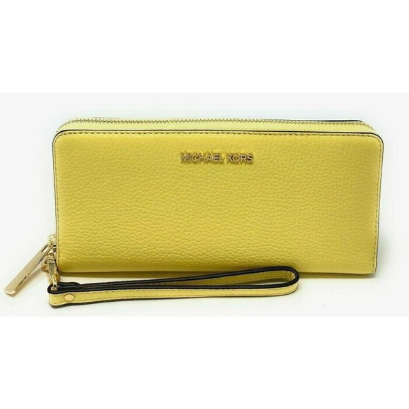 New Michael Kors Jet Set Large Travel Continental wallet Leather Buttercup - Picture 1 of 5